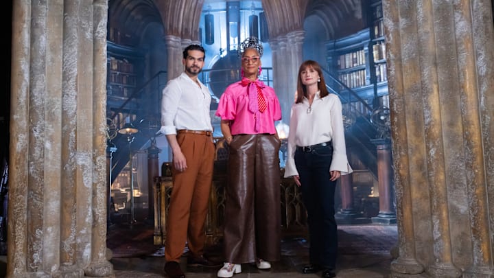 Judges Jozef Youssef, Carla Hall, and Bonnie Wright in Dumbledores Office, as seen on Harry Potter: Wizards of Baking, Season 1.