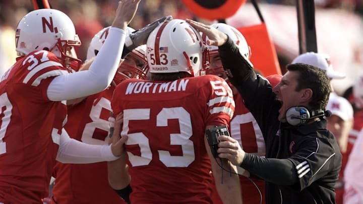 Nebraska linebackers coach Mike Ekeler celebrates with Tyler Wortman after Wortman intercepted a pass against Colorado in 2008.
