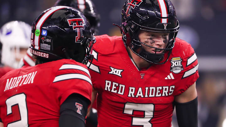 Texas Tech's Coy Eakin (3) and Behren Morton celebrate their second touchdown connection against BYU during the Big 12 Conference championship game, Saturday, Nov. 6, 2025, at AT&T Stadium in Arlington. Texas Tech's Coy Eakin (3) and Behren Morton celebrate their second touchdown connection against BYU during the Big 12 Conference championship game, Saturday, Nov. 6, 2025, at AT&T Stadium in Arlington.