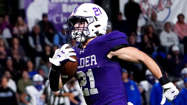Elder Panthers running back runs the ball to the end zone for a touchdown in the first half of a high school football game between the Elder Panthers and Highlands Bluebirds, Friday, Oct. 10, 2025, at The Pit in Cincinnati.