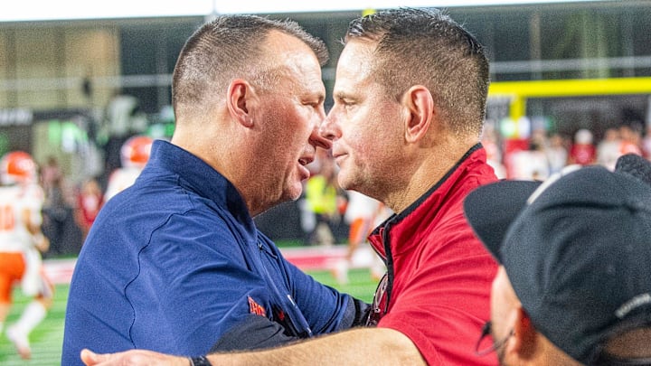 Illinois coach Bret Bielema and Indiana coach Curt Cignetti meet after the game Sept. 20, 2025, at Memorial Stadium