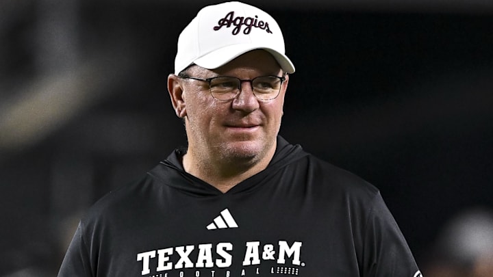 Nov 16, 2024; College Station, Texas, USA; Texas A&M Aggies head coach Mike Elko walks on the field prior to the game against the New Mexico State Aggies at Kyle Field. 