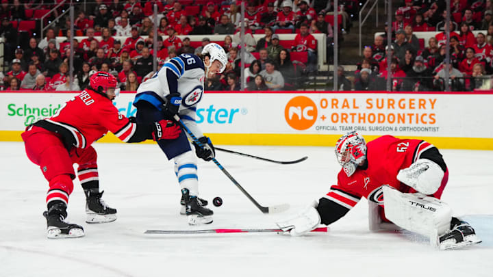 Mar 2, 2024; Raleigh, North Carolina, USA; Carolina Hurricanes goaltender Pyotr Kochetkov (52) and 