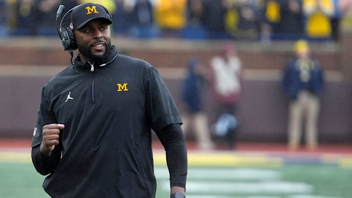 Michigan football coach Sherrone Moore celebrates a play during first-half action between Michigan and Minnesota at Michigan Stadium in Ann Arbor on Saturday, Sept. 28, 2024.