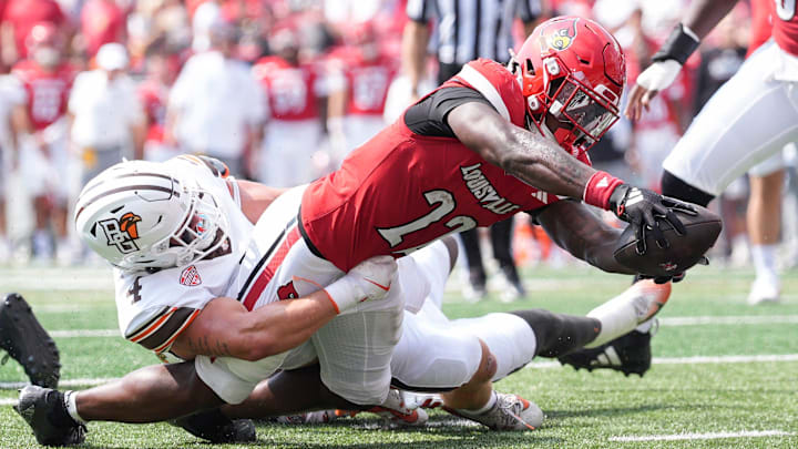 Louisville Cardinals running back Keyjuan Brown (22) lunges towards the endzone for a Cardinals touchdown in the first quarter against Bowling Green at L&N Federal Credit Union Stadium in Louisville, Kentucky Sept. 20, 2025.