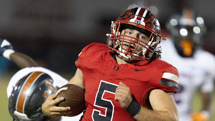 Dunnellon Dylan Donahoe (5) makes a long gain during a 3A FHSAA play off game at Dunnellon High School in Dunnellon, FL on Friday, November 15, 2024. [Alan Youngblood/Ocala Star-Banner]