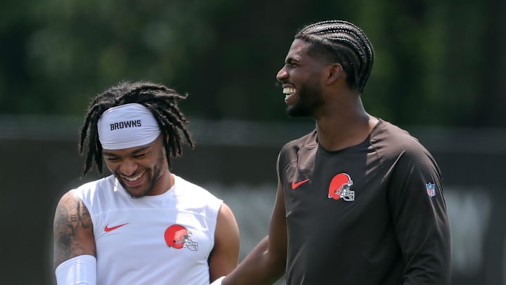 Browns quarterback Shedeur Sanders (right) chats with wide receiver Gage Larvadain after practice, Tuesday, June 10, 2025, in Berea.