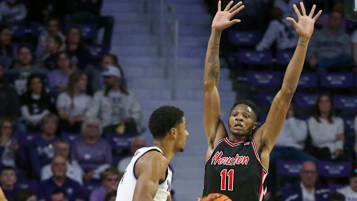 Houston forward Joseph Tugler (right)