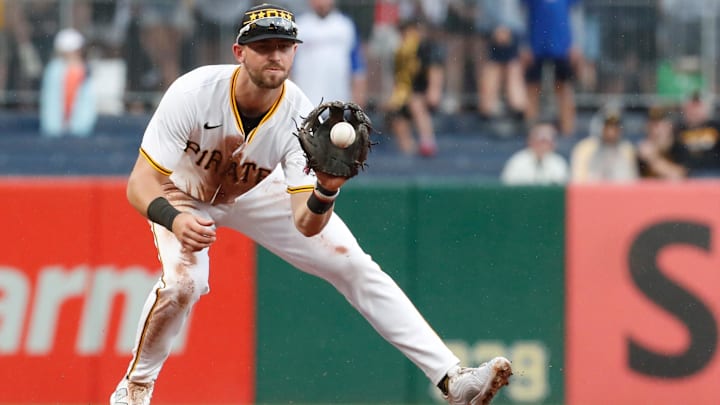 Pittsburgh Pirates second base Jared Triolo (19) fields a ground ball hit by Atlanta Braves shortstop Orlando Arcia (not pictured) for an out during the eighth inning at PNC Park. 