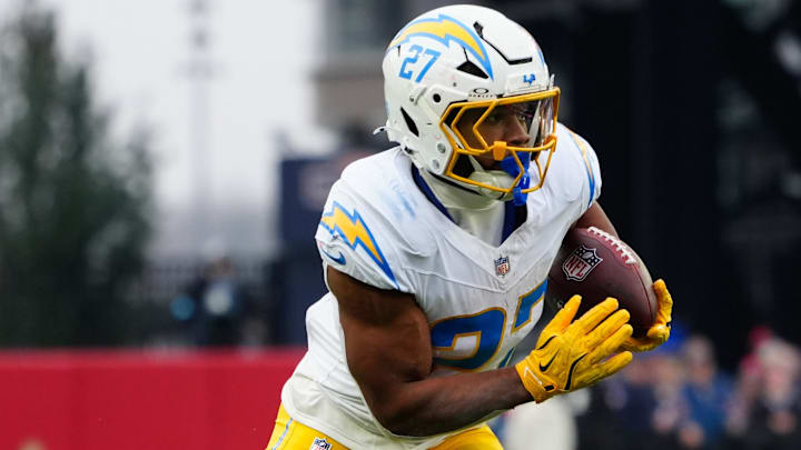 Dec 28, 2024; Foxborough, Massachusetts, USA; Los Angeles Chargers running back J.K. Dobbins (27) runs with the ball after making a catch against the New England Patriots during the first half at Gillette Stadium. Mandatory Credit: Gregory Fisher-Imagn Images Dec 28, 2024; Foxborough, Massachusetts, USA; Los Angeles Chargers running back J.K. Dobbins (27) runs with the ball after making a catch against the New England Patriots during the first half at Gillette Stadium. Mandatory Credit: Gregory Fisher-Imagn Images