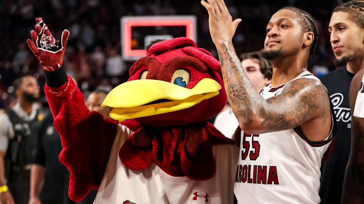 South Carolina Gamecocks mascot Cocky alongside point guard and host extraordinaire Ta'Lon Cooper
