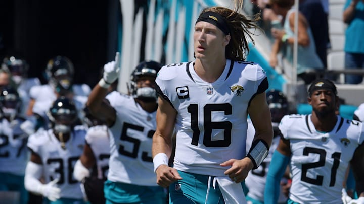 Jacksonville Jaguars quarterback Trevor Lawrence (16) runs out to the field with his teammates before the start of an NFL football game against the Arizona Cardinals on September 26, 2021. [Bob Self/Florida Times-Union
