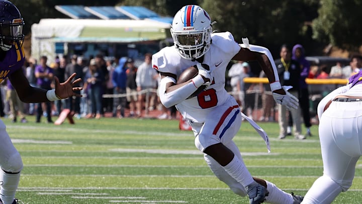 St. Ignatius Jarious Hogan (6) gashed Riordan for 114 yards and two touchdowns and had three catches for 44 yards and another score in a 41-34 loss in 2023. 