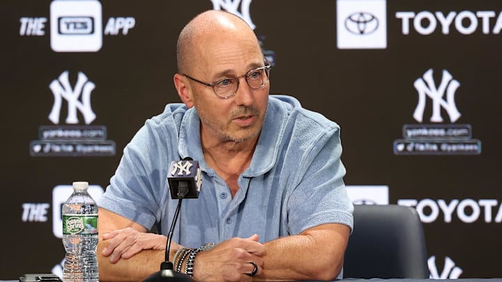 Aug 23, 2023; Bronx, New York, USA; New York Yankees general manager Brian Cashman talks with the media before the game between the Yankees and the Washington Nationals at Yankee Stadium. Mandatory Credit: Vincent Carchietta-Imagn Images
