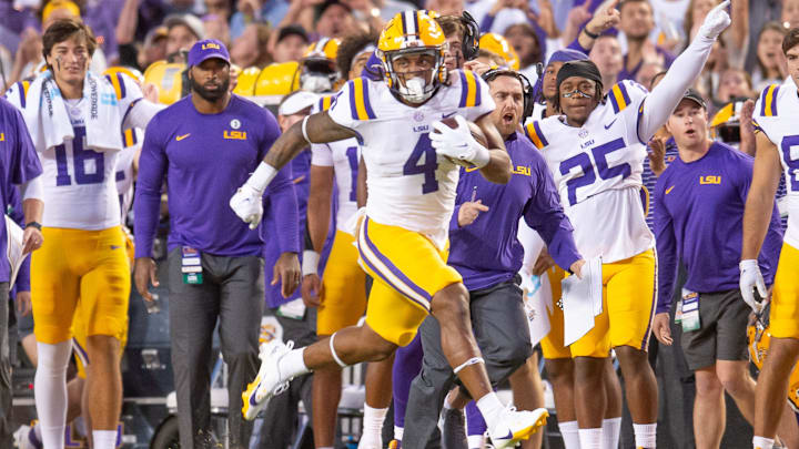 LSU runningback John Emery Jr 4 runs the ball as the LSU Tigers take on the Auburn Tigers at Tiger Stadium in Baton Rouge, Louisiana, Saturday, Oct. 14, 2023.