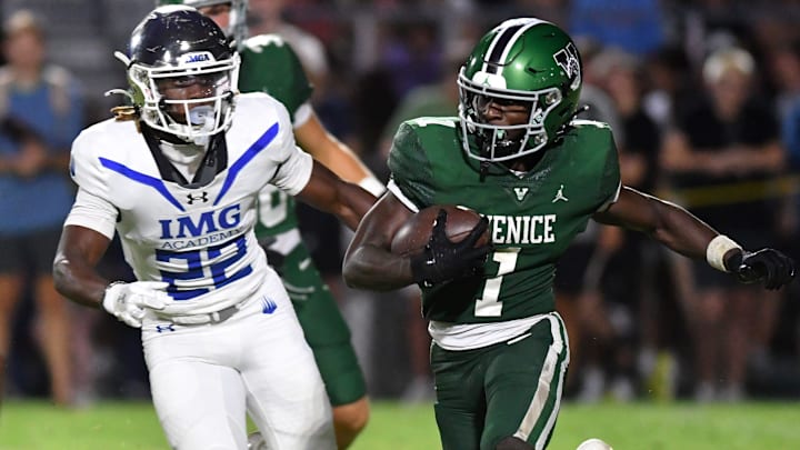 Venice High wide receiver Winston Watkins (#1) is pursued by IMG Academy defender Tranard Roberts (#22). The Venice High School Indians hosted the IMG Academy Ascenders National team on Friday, Oct. 4, 2024.