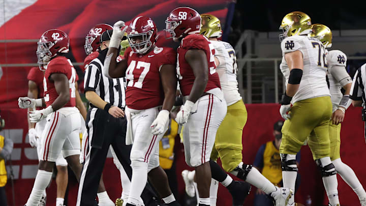 Jan 1, 2021; Arlington, TX, USA; Alabama Crimson Tide defensive lineman Byron Young (47) reacts after sacking Notre Dame Fighting Irish quarterback Ian Book (12)  during the second half in the Rose Bowl at AT&T Stadium. Mandatory Credit: Kevin Jairaj-Imagn Images