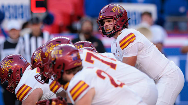 Nov 9, 2024; Kansas City, Missouri, USA; Iowa State Cyclones quarterback Rocco Becht (3) behind the line during the first quarter against the Kansas Jayhawks at GEHA Field at Arrowhead Stadium. Mandatory Credit: William Purnell-Imagn Images Nov 9, 2024; Kansas City, Missouri, USA; Iowa State Cyclones quarterback Rocco Becht (3) behind the line during the first quarter against the Kansas Jayhawks at GEHA Field at Arrowhead Stadium. Mandatory Credit: William Purnell-Imagn Images