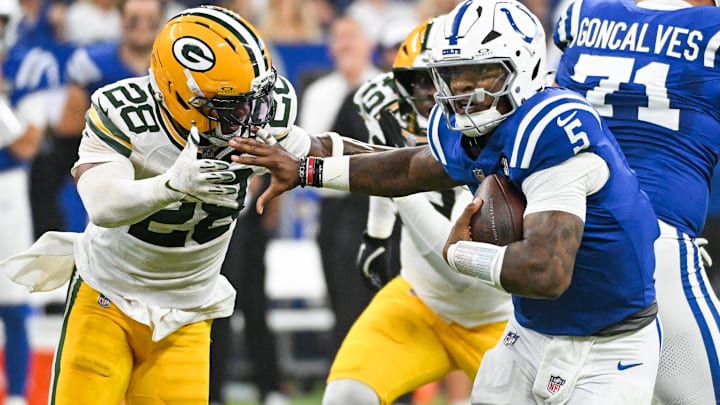 Aug 16, 2025; Indianapolis, Indiana, USA; Indianapolis Colts quarterback Anthony Richardson Sr. (5) runs the ball against Green Bay Packers linebacker Isaiah Simmons (28) during the first half at Lucas Oil Stadium. Mandatory Credit: Robert Goddin-Imagn Images Aug 16, 2025; Indianapolis, Indiana, USA; Indianapolis Colts quarterback Anthony Richardson Sr. (5) runs the ball against Green Bay Packers linebacker Isaiah Simmons (28) during the first half at Lucas Oil Stadium. Mandatory Credit: Robert Goddin-Imagn Images