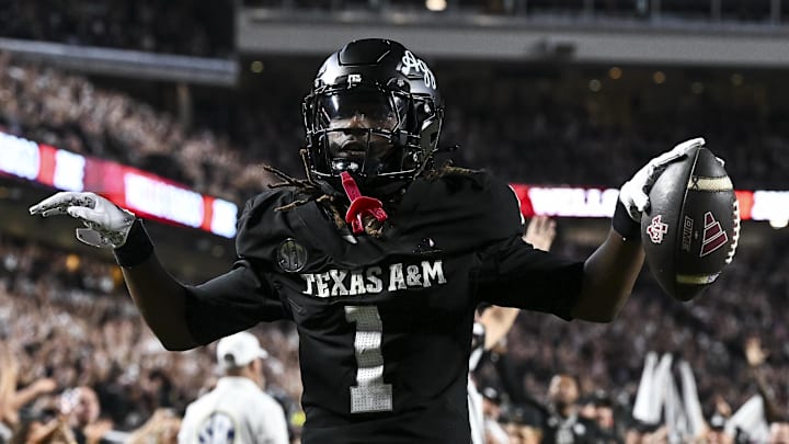 Oct 4, 2025; College Station, Texas, USA; Texas A&M Aggies wide receiver Mario Craver (1) celebrates after scoring a touchdown during the fourth quarter against the Mississippi State Bulldogs at Kyle Field. Mandatory Credit: Maria Lysaker-Imagn Images 