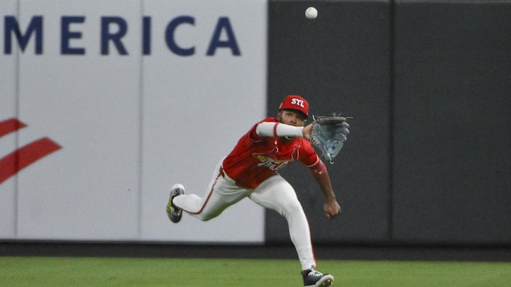 Aug 15, 2025; St. Louis, Missouri, USA; St. Louis Cardinals center fielder Victor Scott II (11) dives and catches a line drive hit by New York Yankees shortstop Anthony Volpe (not pictured) during the eighth inning at Busch Stadium. Mandatory Credit: Jeff Curry-Imagn Images Aug 15, 2025; St. Louis, Missouri, USA; St. Louis Cardinals center fielder Victor Scott II (11) dives and catches a line drive hit by New York Yankees shortstop Anthony Volpe (not pictured) during the eighth inning at Busch Stadium. Mandatory Credit: Jeff Curry-Imagn Images