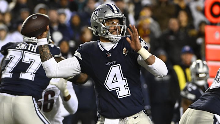 Jan 7, 2024; Landover, Maryland, USA; Dallas Cowboys quarterback Dak Prescott (4) attempts a pass against the Washington Commanders during the first half at FedExField. Mandatory Credit: Brad Mills-USA TODAY Sports