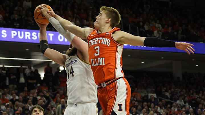 Dec 6, 2024; Evanston, Illinois, USA; Illinois Fighting Illini forward Ben Humrichous (3) defends Northwestern Wildcats center Matthew Nicholson (34) during the second half at Welsh-Ryan Arena. Mandatory Credit: David Banks-Imagn Images Dec 6, 2024; Evanston, Illinois, USA; Illinois Fighting Illini forward Ben Humrichous (3) defends Northwestern Wildcats center Matthew Nicholson (34) during the second half at Welsh-Ryan Arena. Mandatory Credit: David Banks-Imagn Images