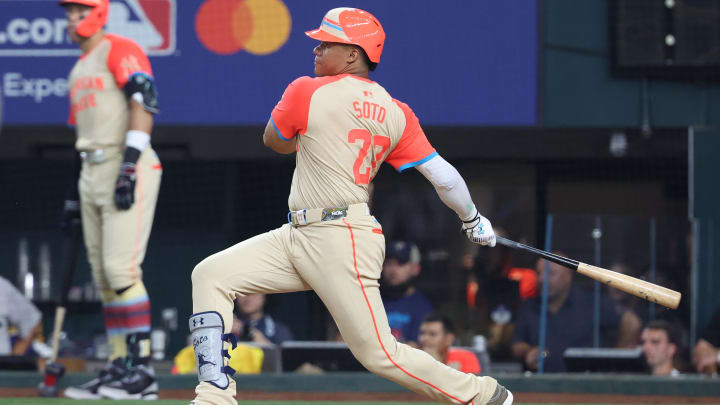 Jul 16, 2024; Arlington, Texas, USA; American League right fielder Juan Soto of the New York Yankees (22) hits a two RBI double in the third inning against the National League during the 2024 MLB All-Star game at Globe Life Field. Mandatory Credit: Kevin Jairaj-USA TODAY Sports