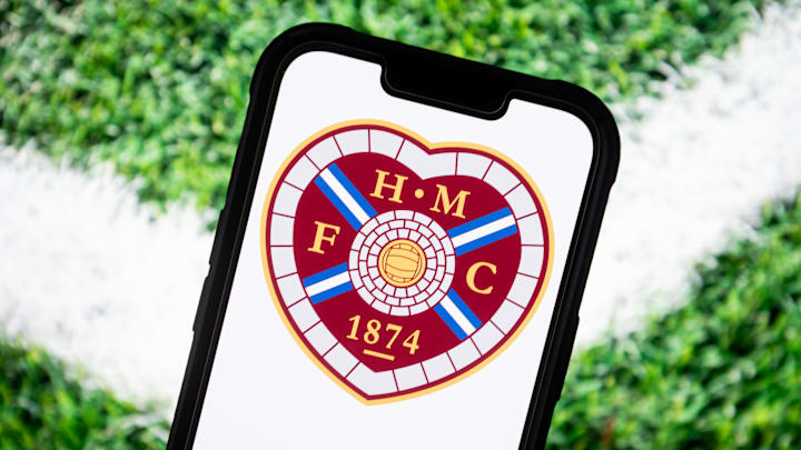 In this photo illustration, a Hearts FC football club logo... In this photo illustration, a Hearts FC football club logo...