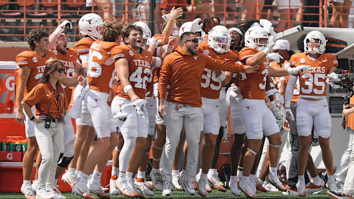 Sep 13, 2025; Austin, Texas, USA; Texas Longhorns bench players and coaches react before the kickoff to start a game against the Texas El Paso Miners at Darrell K Royal-Texas Memorial Stadium. Mandatory Credit: Scott Wachter-Imagn Images