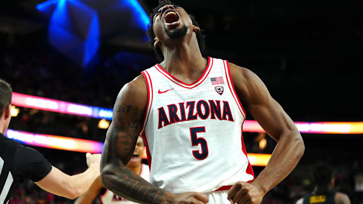Mar 14, 2024; Las Vegas, NV, USA; Arizona Wildcats guard KJ Lewis (5) celebrates after making a play