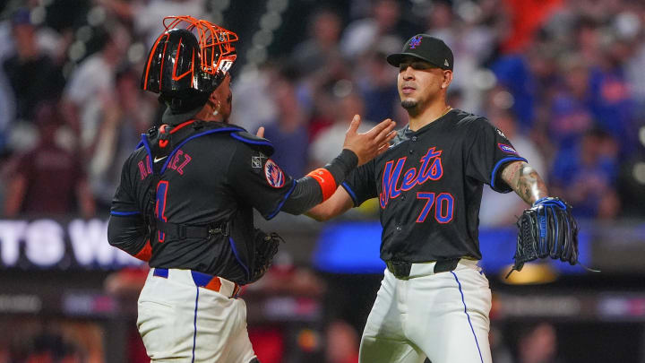 Jul 10, 2024; New York City, New York, USA; New York Mets catcher Francisco Alvarez (4) and pitcher Jose Butto (70) celebrate a victory against the Washington Nationals at Citi Field. Mandatory Credit: Gregory Fisher-USA TODAY Sports