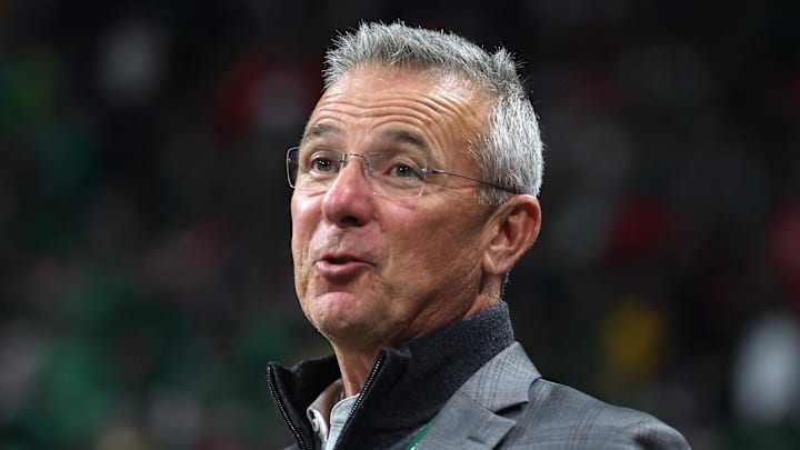 Jan 20, 2025; Atlanta, GA, USA; Urban Meyer looks on during the second half the CFP National Championship college football game at Mercedes-Benz Stadium. Mandatory Credit: Mark J. Rebilas-Imagn Images