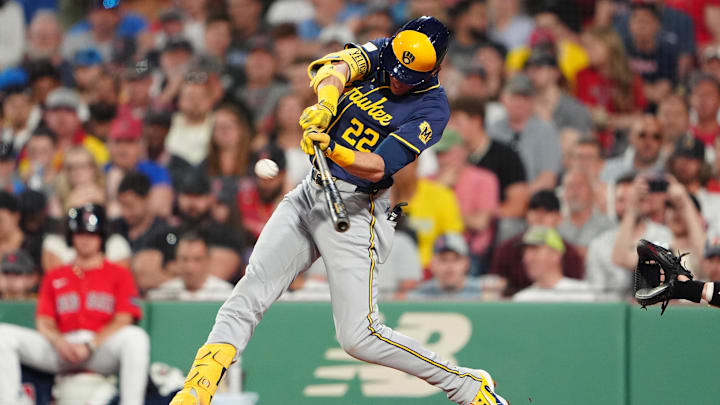 May 24, 2024; Boston, Massachusetts, USA; Milwaukee Brewers designated hitter Christian Yelich (22) hits an RBI double against the Boston Red Sox during the fifth inning at Fenway Park. Mandatory Credit: Gregory Fisher-USA TODAY Sports