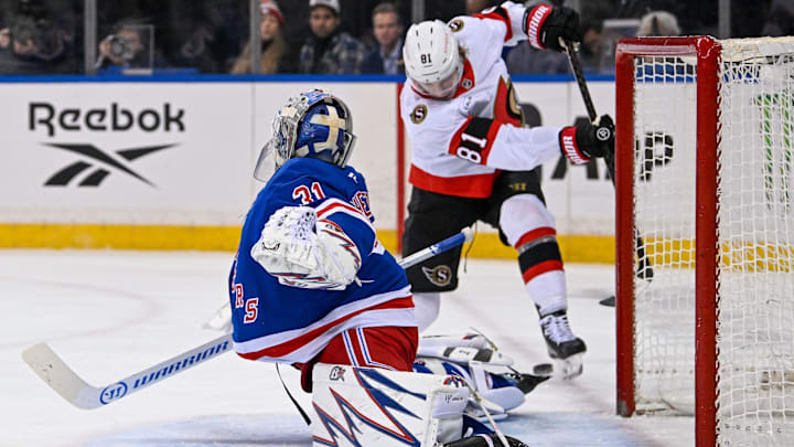 Jan 21, 2025; New York, New York, USA;  Ottawa Senators right wing Adam Gaudette (81) attemtps a shot on New York Rangers goaltender Igor Shesterkin (31) during the first period at Madison Square Garden. Mandatory Credit: Dennis Schneidler-Imagn Images