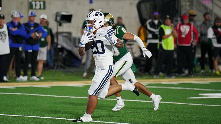 Sep 19, 2026; Fort Collins, Colorado, USA; BYU Cougars running back Journee Tonga (20) scores a touchdown against the Colorado State Rams at Sonny Lubick Field at Canvas Stadium. Mandatory Credit: Andrew Rydland-Imagn Images Sep 19, 2026; Fort Collins, Colorado, USA; BYU Cougars running back Journee Tonga (20) scores a touchdown against the Colorado State Rams at Sonny Lubick Field at Canvas Stadium. Mandatory Credit: Andrew Rydland-Imagn Images