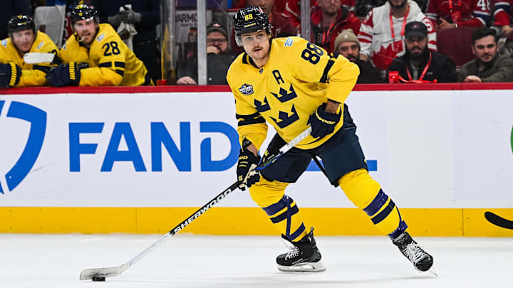 Feb 12, 2025; Montreal, Quebec, CAN; [Imagn Images direct customers only] Team Sweden forward William Nylander (88) plays the puck against Team Canada in overtime during a 4 Nations Face-Off ice hockey game at Bell Centre. Mandatory Credit: David Kirouac-Imagn Images