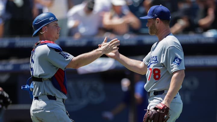 Dodgers catcher Will Smith (16) and pitcher Ben Casparius (78) react after beating the Tampa Bay Rays at George M. Steinbrenner Field on Aug. 3. Dodgers catcher Will Smith (16) and pitcher Ben Casparius (78) react after beating the Tampa Bay Rays at George M. Steinbrenner Field on Aug. 3.