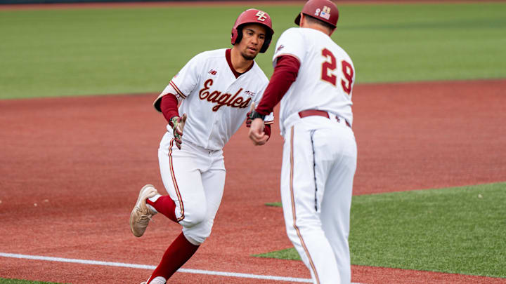 Former Boston College outfielder Cameron Leary rounds third base towards home after home run. 
