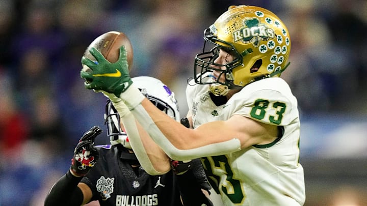 Westfield Shamrocks TELS Caiden Snow (83) catches the ball Saturday, Nov. 29, 2025, during the IHSAA Class 6A state championship game at Lucas Oil Stadium in Indianapolis.