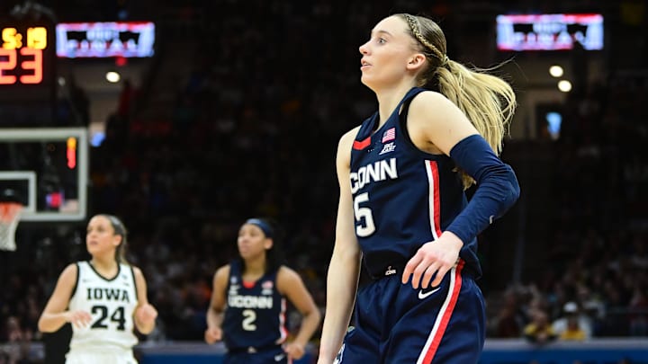 Apr 5, 2024; Cleveland, OH, USA; Connecticut Huskies guard Paige Bueckers (5) reacts against the Iowa Hawkeyes in the semifinals of the Final Four of the womens 2024 NCAA Tournament at Rocket Mortgage FieldHouse. Mandatory Credit: Ken Blaze-Imagn Images Apr 5, 2024; Cleveland, OH, USA; Connecticut Huskies guard Paige Bueckers (5) reacts against the Iowa Hawkeyes in the semifinals of the Final Four of the womens 2024 NCAA Tournament at Rocket Mortgage FieldHouse. Mandatory Credit: Ken Blaze-Imagn Images