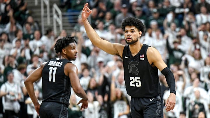 Michigan State's Malik Hall, right, celebrates his 3-pointer against Illinois during the first half