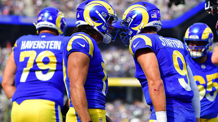 Oct 8, 2023; Inglewood, California, USA; Los Angeles Rams wide receiver Puka Nacua (17) celebrates his touchdown scored against the Philadelphia Eagles with quarterback Matthew Stafford (9) during the first half at SoFi Stadium. Mandatory Credit: Gary A. Vasquez-Imagn Images