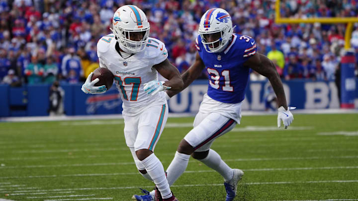 Miami Dolphins wide receiver Jaylen Waddle (17) makes a catch against Buffalo Bills cornerback Rasul Douglas (31) during the second half at Highmark Stadium. Miami Dolphins wide receiver Jaylen Waddle (17) makes a catch against Buffalo Bills cornerback Rasul Douglas (31) during the second half at Highmark Stadium.