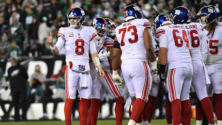 Jan 21, 2023; Philadelphia, Pennsylvania, USA; New York Giants quarterback Daniel Jones (8) in the huddle against the Philadelphia Eagles during an NFC divisional round game at Lincoln Financial Field.  
