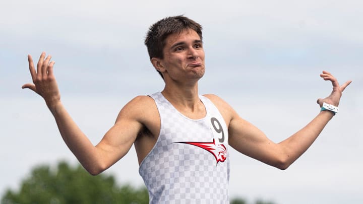 Western Dubuque's Quentin Nauman reacts after recording a new record in the 3A 800 meter final during the 2025 Iowa high school state track and field meet at Drake Stadium on May 24, 2025, in Des Moines. Western Dubuque's Quentin Nauman reacts after recording a new record in the 3A 800 meter final during the 2025 Iowa high school state track and field meet at Drake Stadium on May 24, 2025, in Des Moines.