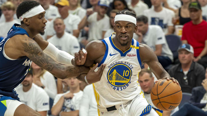 May 14, 2025; Minneapolis, Minnesota, USA; Golden State Warriors forward Jimmy Butler III (10) drives to the basket past Minnesota Timberwolves forward Jaden McDaniels (3) in the second half during game five of the second round for the 2025 NBA Playoffs at Target Center. Mandatory Credit: Jesse Johnson-Imagn Images May 14, 2025; Minneapolis, Minnesota, USA; Golden State Warriors forward Jimmy Butler III (10) drives to the basket past Minnesota Timberwolves forward Jaden McDaniels (3) in the second half during game five of the second round for the 2025 NBA Playoffs at Target Center. Mandatory Credit: Jesse Johnson-Imagn Images