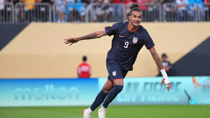 Jun 29, 2025; Minneapolis, Minnesota, USA; United States of America forward Damion Downs (9) celebrates after defeating Costa Rica in a shoot out during a quarterfinal match of the 2025 Gold Cup at U.S. Bank Stadium. 