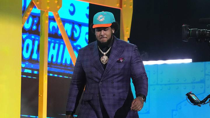 Apr 23, 2026; Pittsburgh, PA, USA; Alabama Crimson Tide tackle Kadyn Proctor is selected by the Miami Dolphins as the number twelve pick during the 2026 NFL Draft at Acrisure Stadium. Mandatory Credit: Kirby Lee-Imagn Images