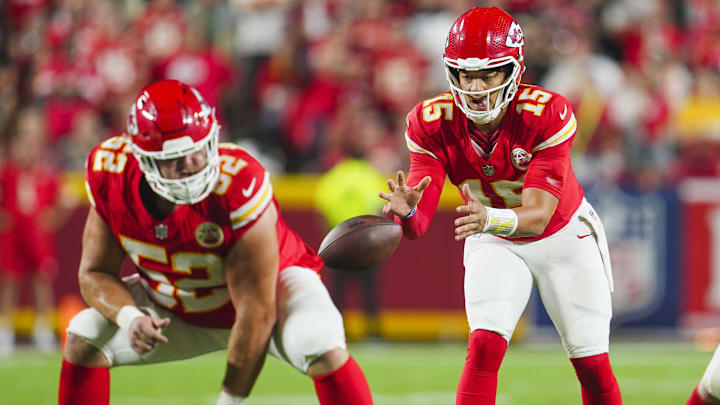 Sep 5, 2024; Kansas City, Missouri, USA; Kansas City Chiefs starting quarterback Patrick Mahomes (15) takes the snap from center Creed Humphrey (52) during the second half against the Baltimore Ravens at GEHA Field at Arrowhead Stadium. Mandatory Credit: Jay Biggerstaff-Imagn Images Sep 5, 2024; Kansas City, Missouri, USA; Kansas City Chiefs starting quarterback Patrick Mahomes (15) takes the snap from center Creed Humphrey (52) during the second half against the Baltimore Ravens at GEHA Field at Arrowhead Stadium. Mandatory Credit: Jay Biggerstaff-Imagn Images